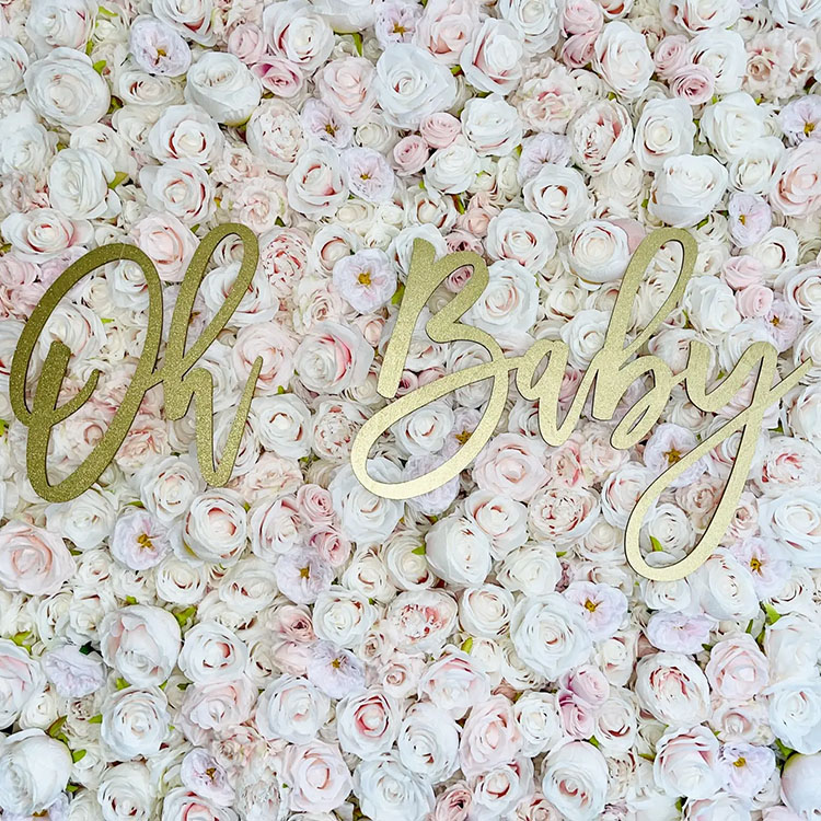 White, Pink, and blush flower wall rental with custom acrylic signs that reads oh baby.